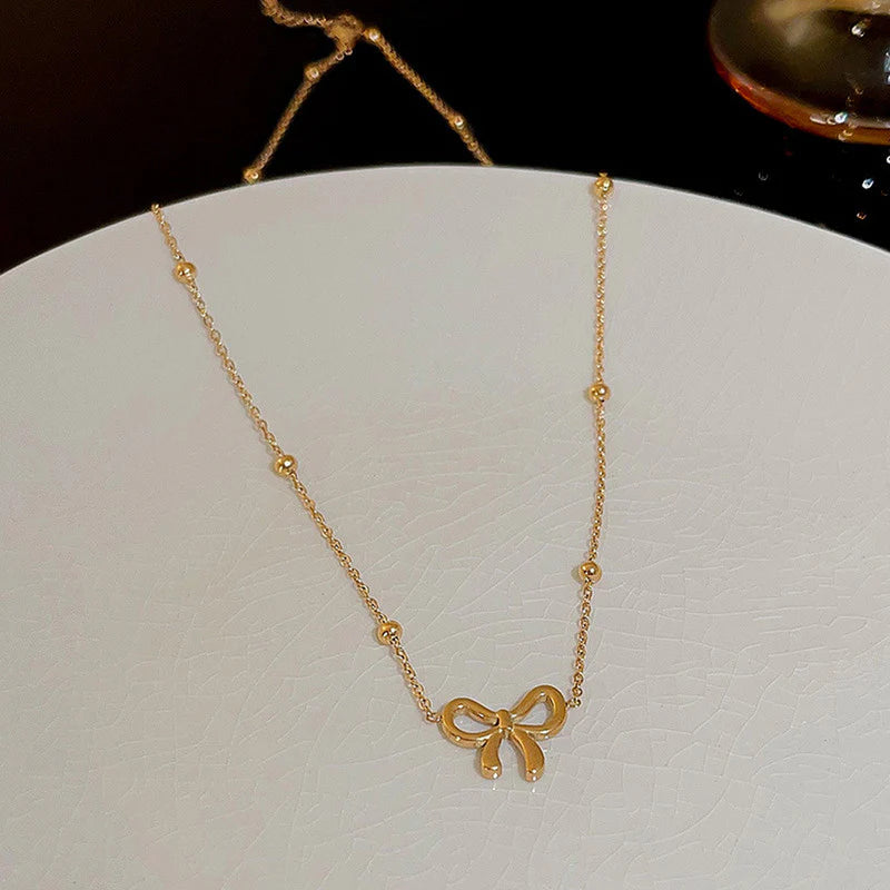 Minimal Bow Pendant