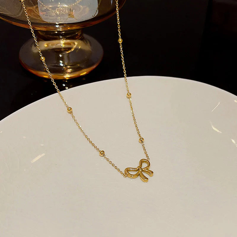 Minimal Bow Pendant
