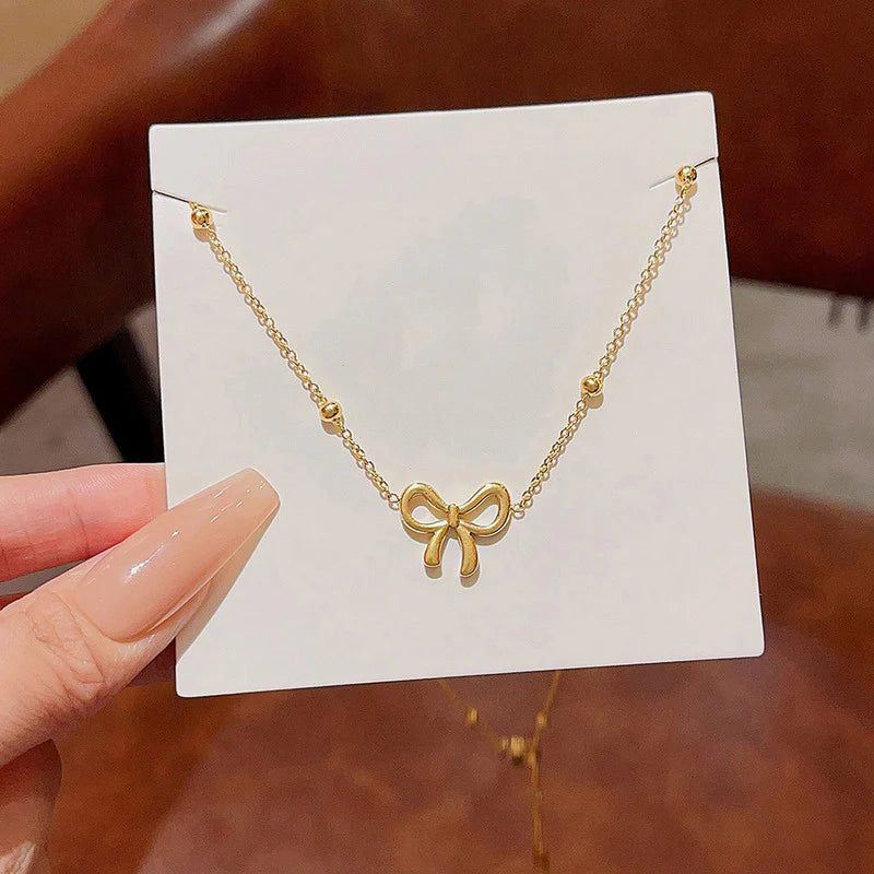 Minimal Bow Pendant
