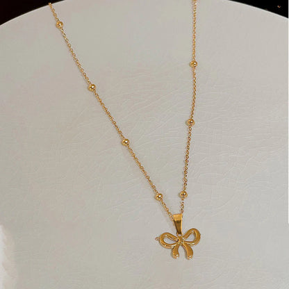 Minimal Bow Pendant